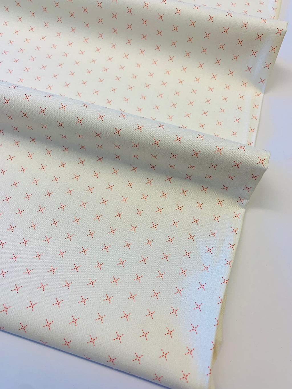 Stitched Vanilla and Persimmon Cross Hatch by Moda